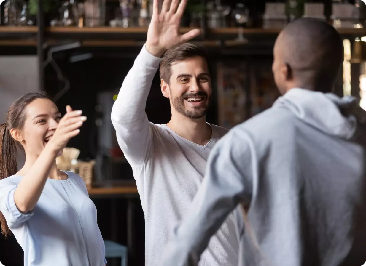 group of friends high five