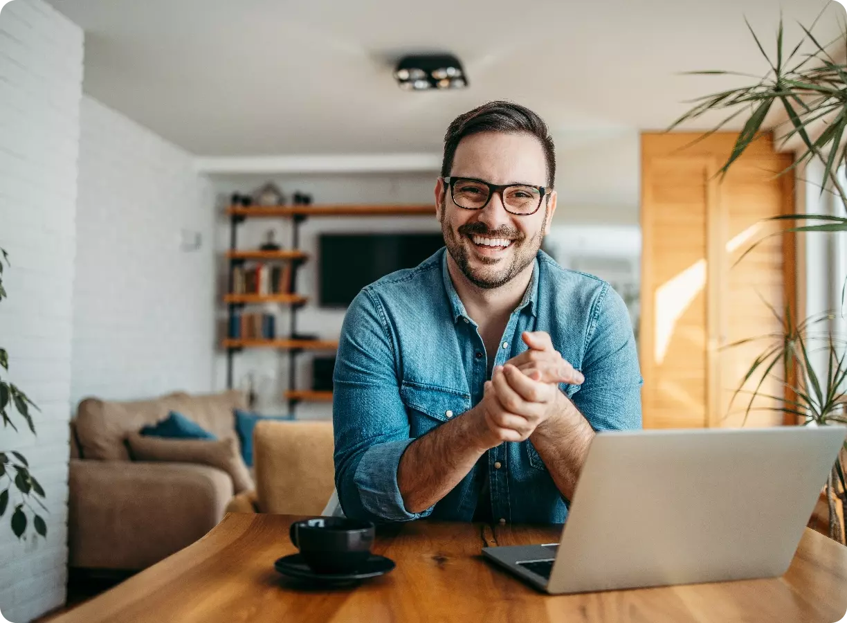 man checking a laptop